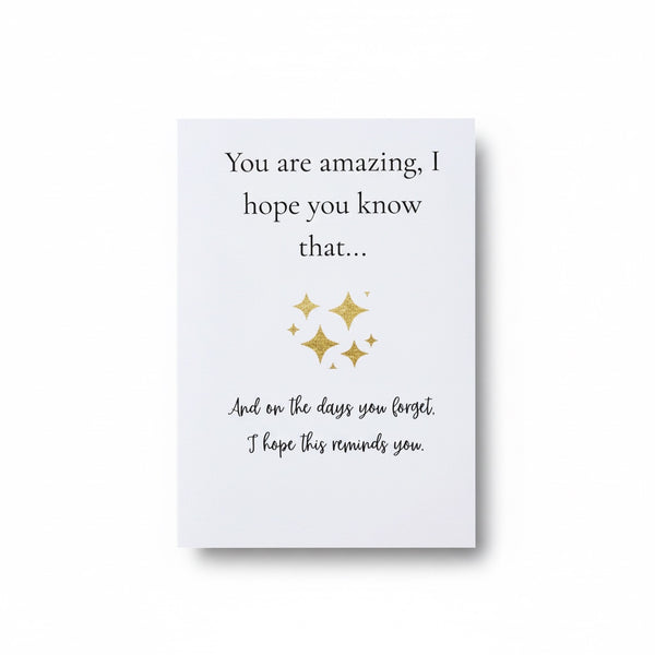 A white rectangular greeting card with black text reading 'You are amazing, I hope you know that.