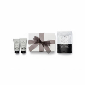 white box with black ribbon, bath salts with black and white colouring