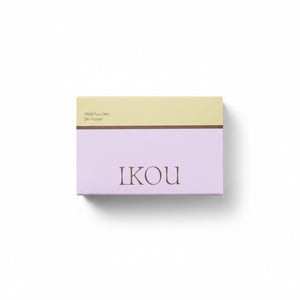 A rectangular cosmetic box for IKOU Mini Eye Diao De-Stress, featuring a two-tone design with a pale yellow top section and a lavender-purple bottom section, set against a plain white background.