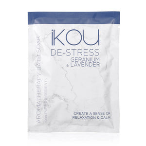A package of iKOU De-Stress Bath Soak in Geranium & Lavender scent, featuring a white marble-patterned pouch with a blue top band and blue text.