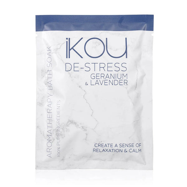 A package of iKOU De-Stress Bath Soak in Geranium & Lavender scent, featuring a white marble-patterned pouch with a blue top band and blue text.