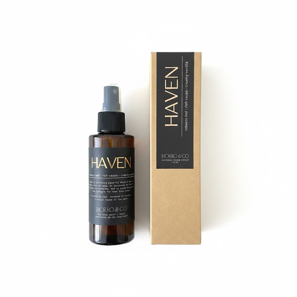 A dark amber spray bottle labeled HAVEN by MORRO & CO next to its kraft paper packaging box on a clean white background.