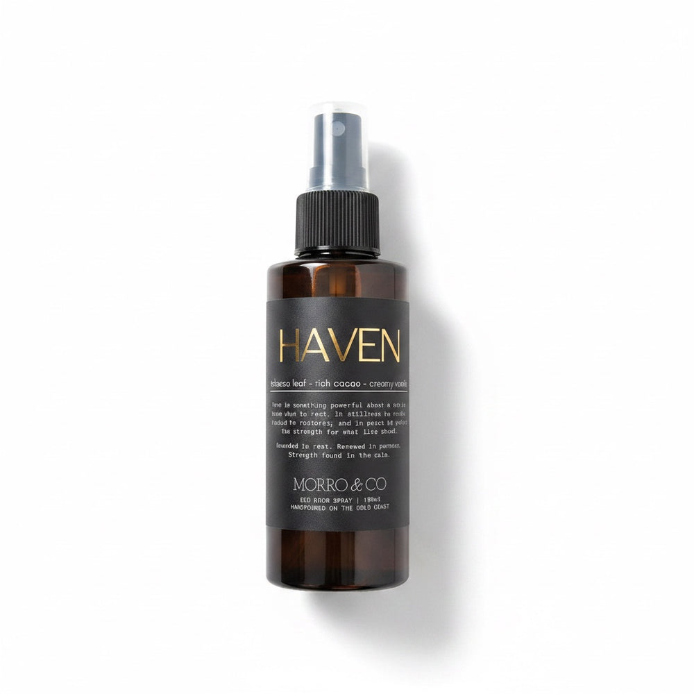 A dark amber spray bottle labeled HAVEN by MORRO & CO next to its kraft paper packaging box on a clean white background.